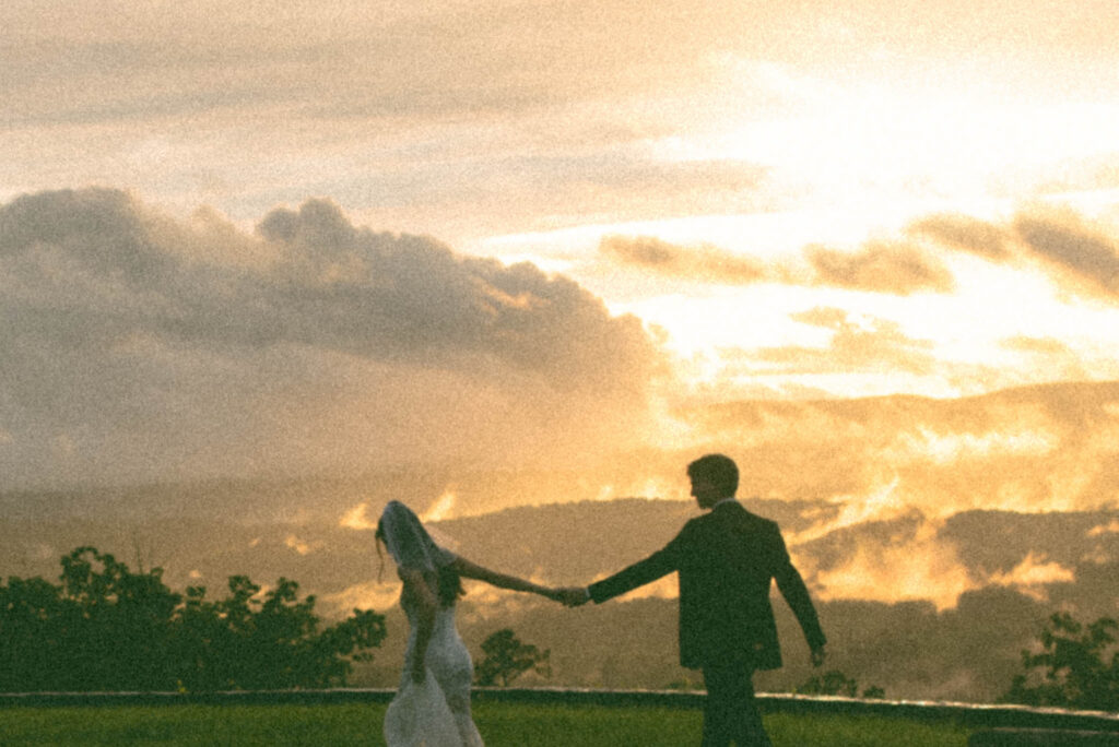 Bride & Groom dancing in the sunset at North georgia Elopement with Mountains in the background