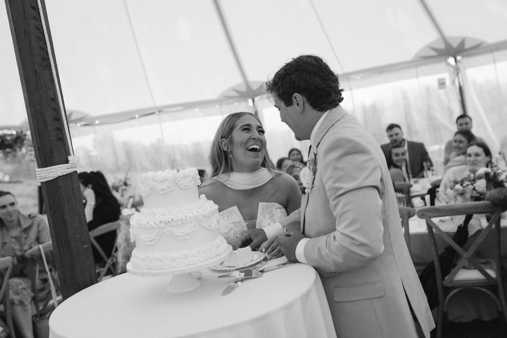 bride & groom cut the cake 