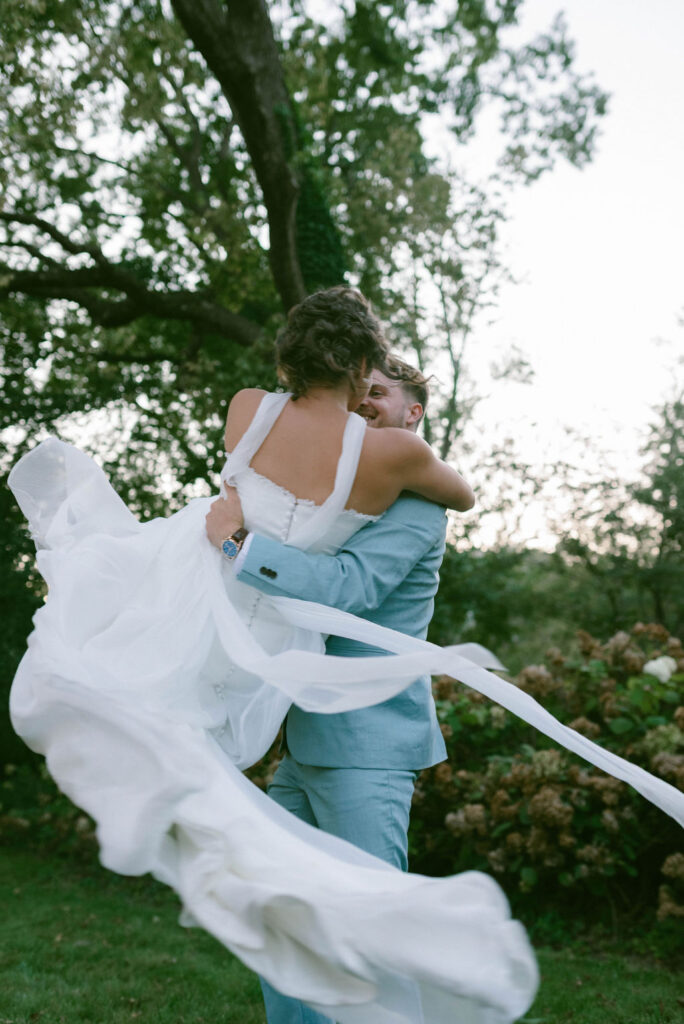 bride and groom dancing at jane austen inspired intimate backyard wedding