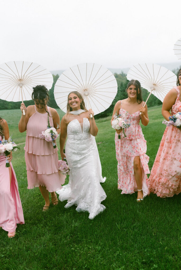 bride & bridesmaids with parasols 