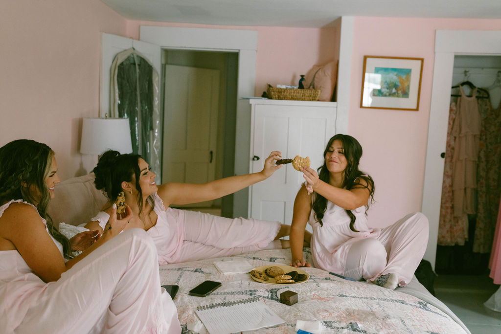 bridesmaids getting ready in pink room Saddle Hill Farm wedding