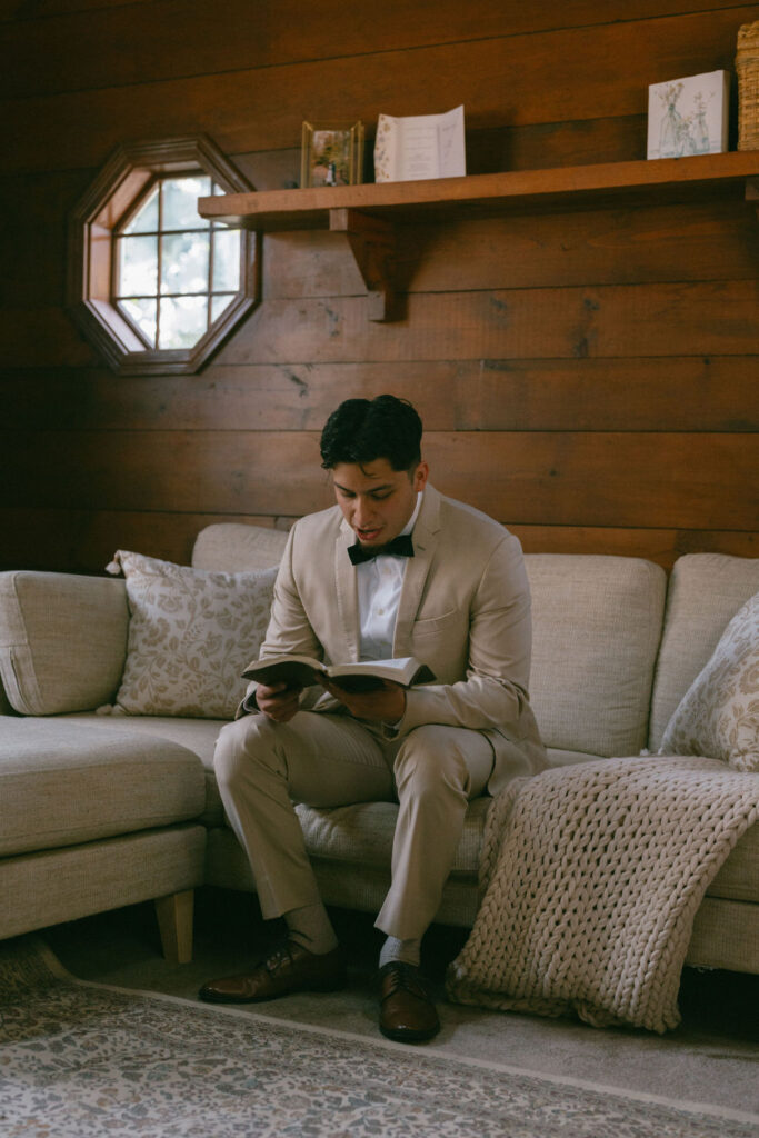 groom reading the bible before the ceremony