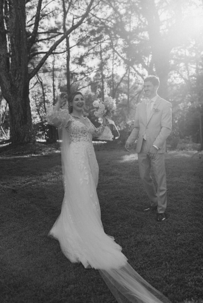 b&w photo of the bride and groom after their ceremony 