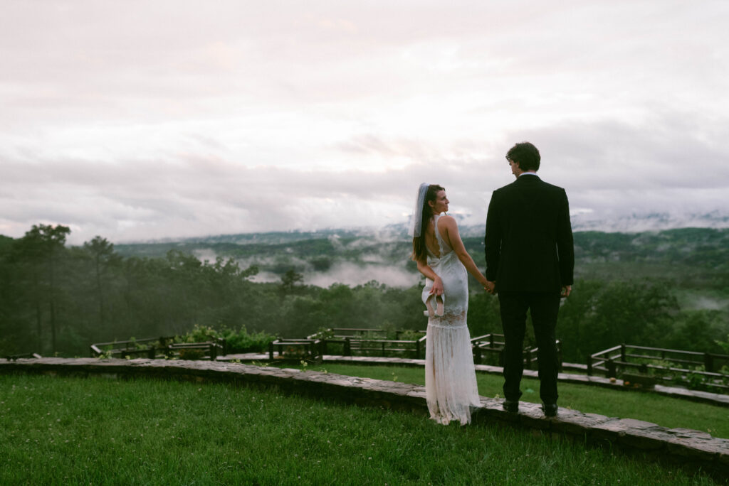 Bride & Groom dancing in the sunset at North georgia Elopement with Mountains in the background