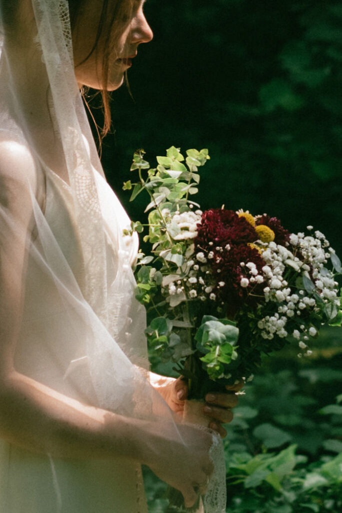 photo of the bride holding her bouquet