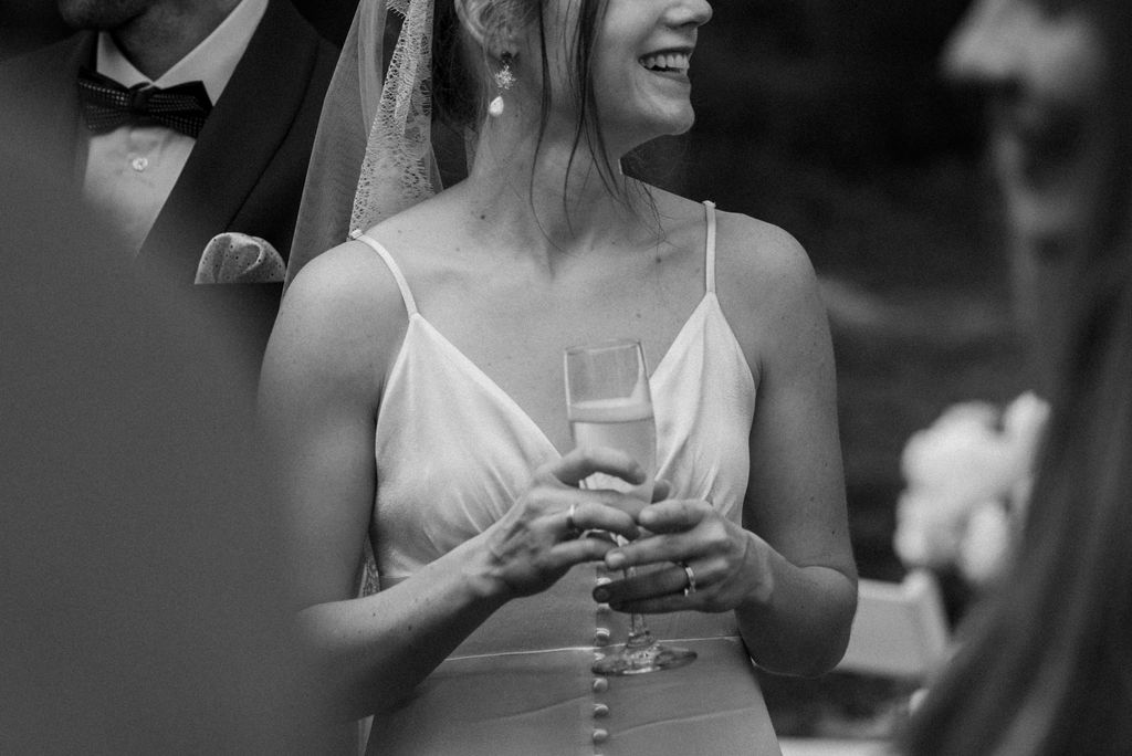 bride with a glass of champagne