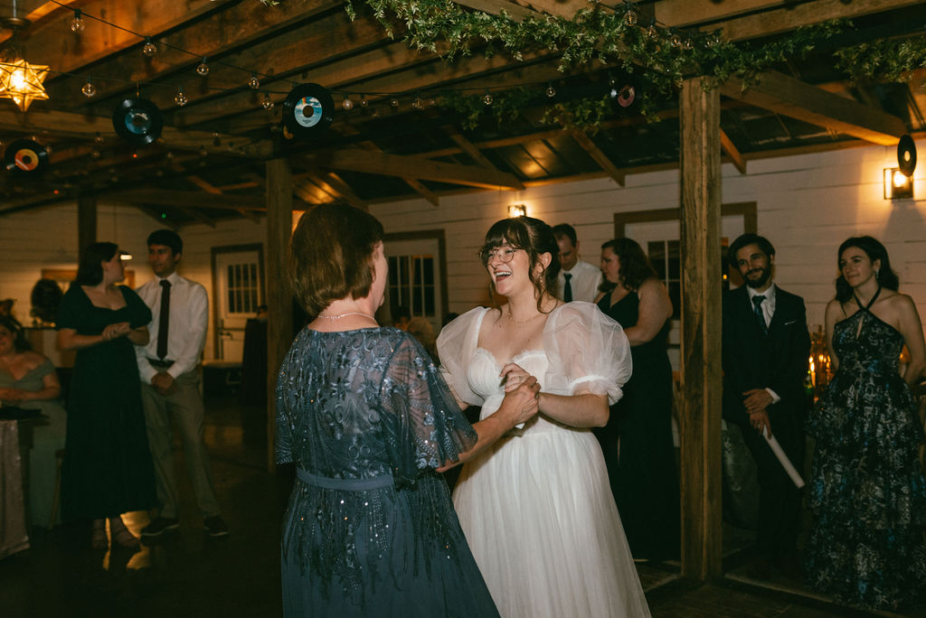 bride dancing with her mom 