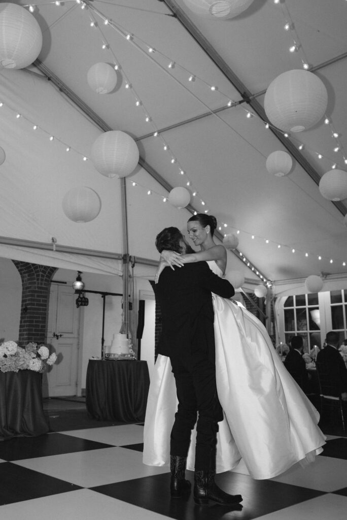 Bride and groom first dance at Cheekwood with black and white checkered floor