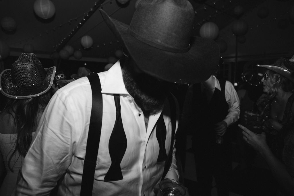 Reception at Cheekwood Estate with checkered dance floor. Bride & groom dancing 