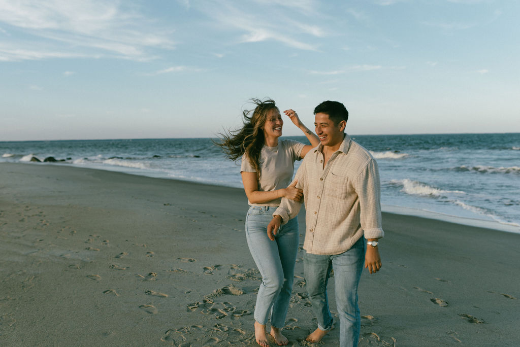 couple at the beach during their engagement photoshoot