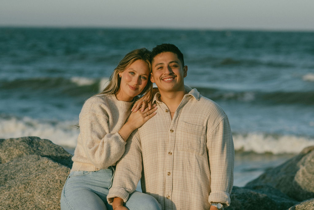 couple posing for the camera at their engagement photoshoot