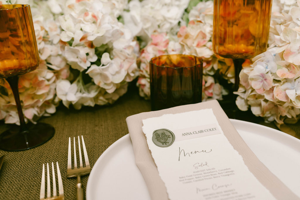 table decor hydrangeas and menu