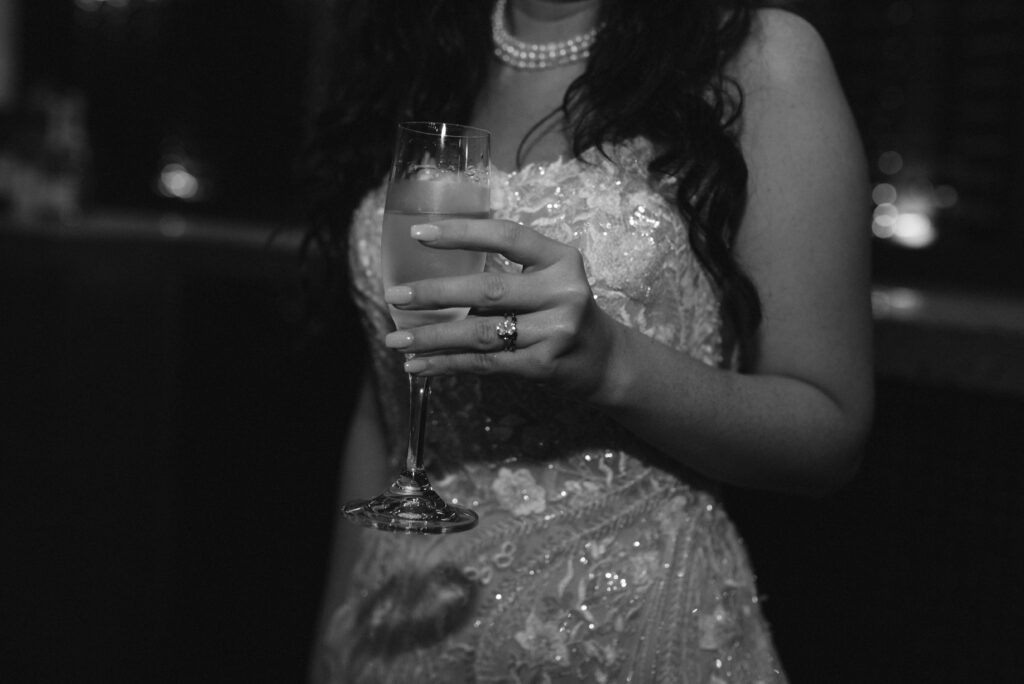  Bride drinking champagne wedding ring