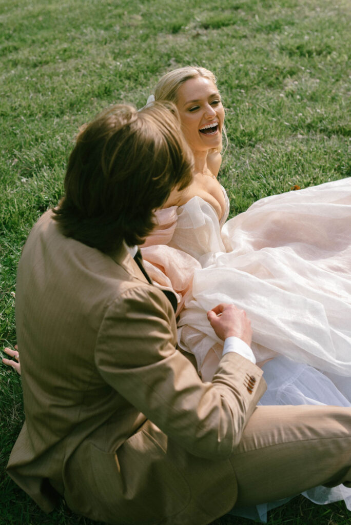 brde and groom in pink dress smiling