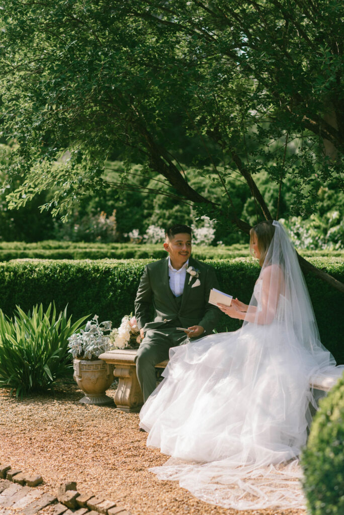 Bride and groom reading their private vows