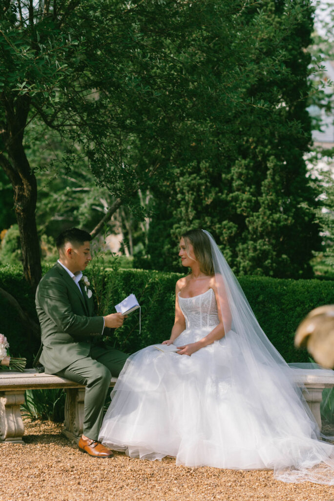 Bride and groom reading their private vows