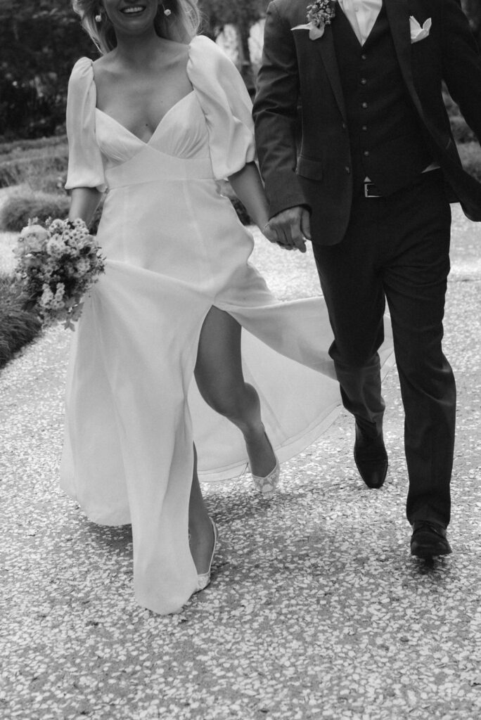 bride and groom walking down the isle 