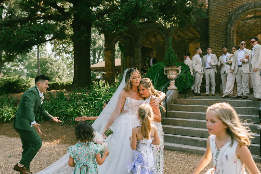 Bride and groom with their family