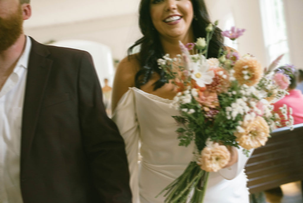 Bride and groom leaving ceremony 