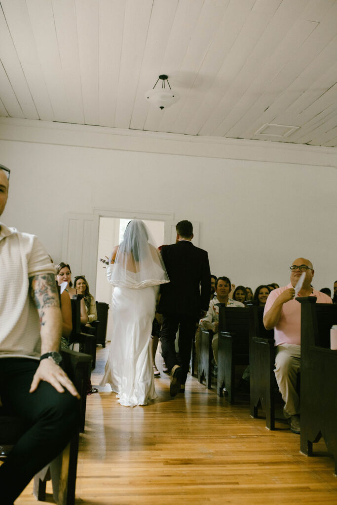 Bride and groom leaving ceremony 