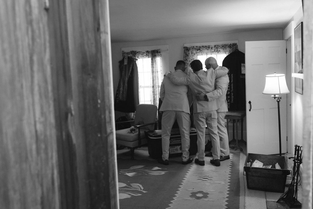 groom and groomsmen hanging out
