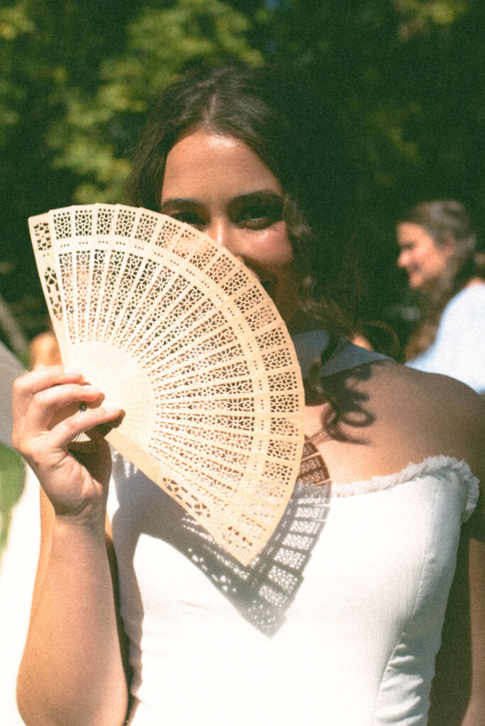 bride getting ready at jane austen inspired intimate backyard wedding