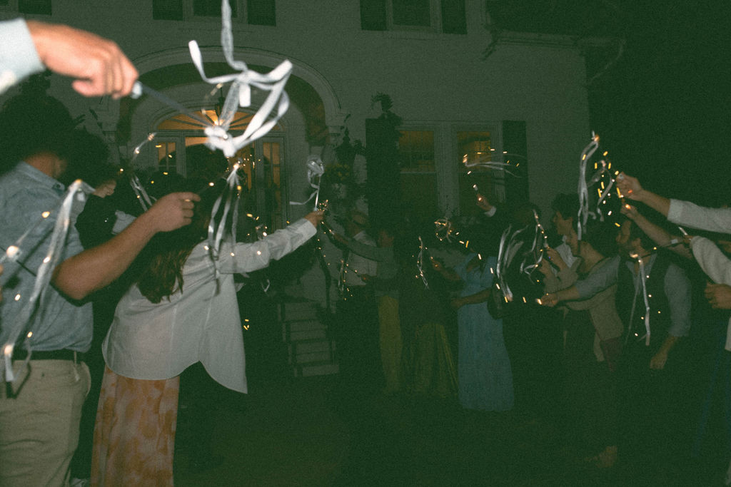 reception exit at a jane austen inspired backyard wedding