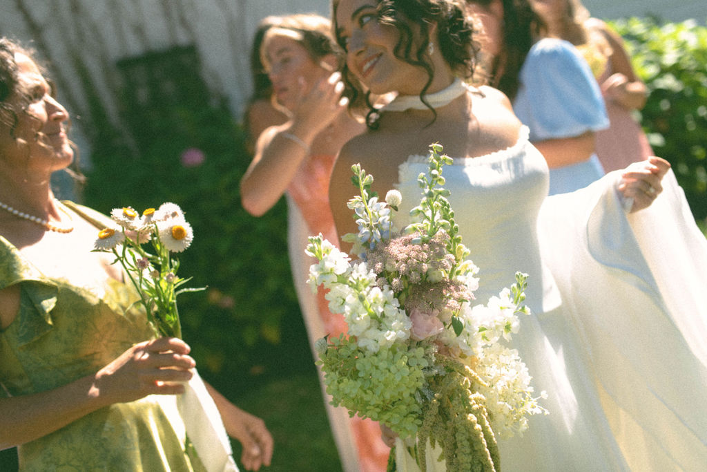 bride & bridesmaids getting ready at jane austen inspired intimate backyard wedding