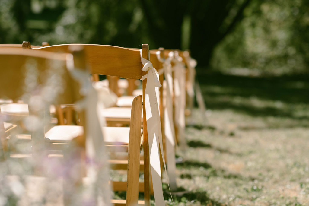 bride & groom ceremony at a jane austen inspired intimate backyard wedding