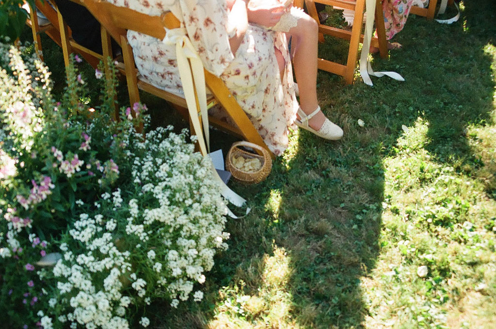 bride & groom ceremony at a jane austen inspired intimate backyard wedding 35 mm film