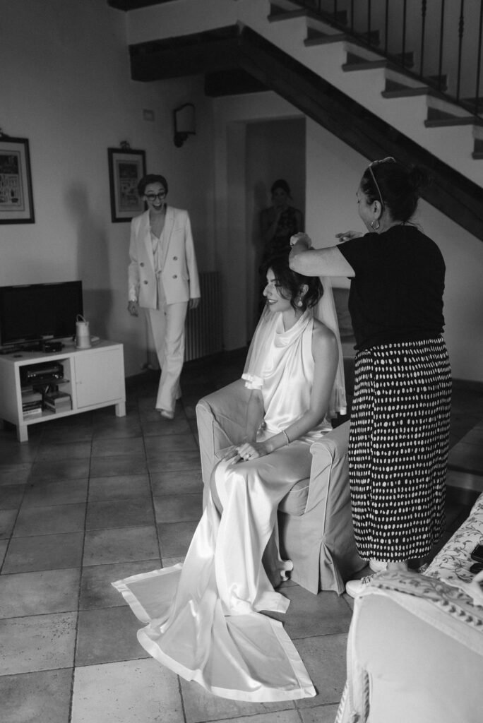an intimate Italian escape wedding bride's getting ready together 
