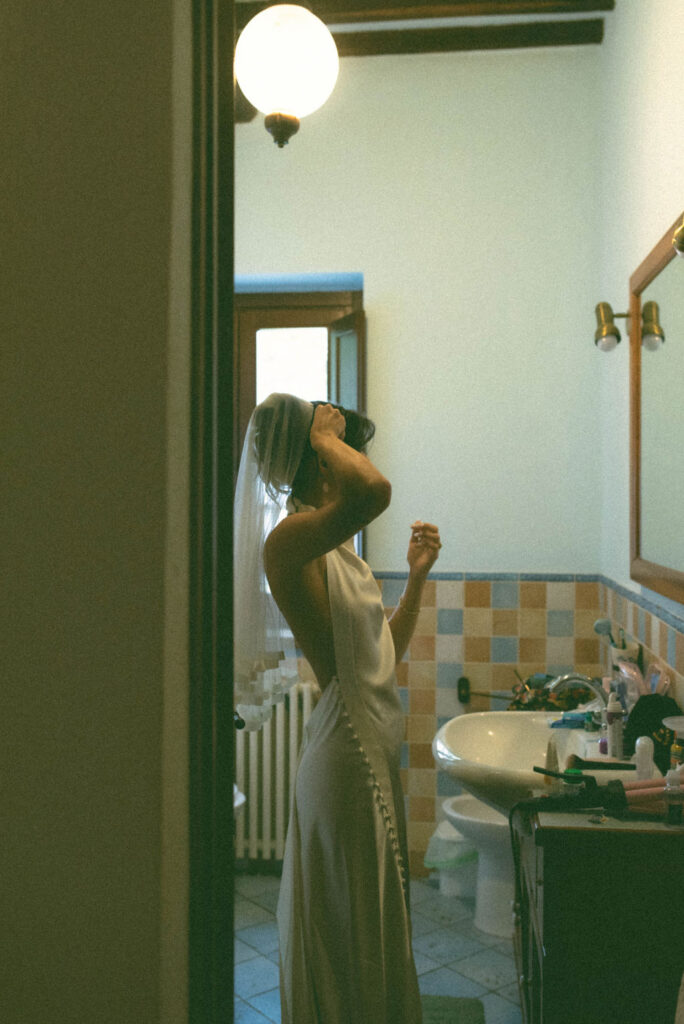 an intimate Italian escape wedding bride's getting ready together 