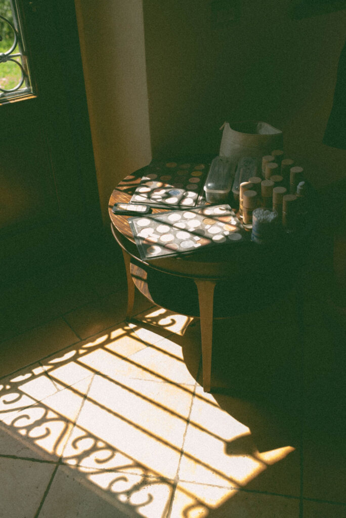 an intimate Italian escape wedding details shadows and makeup 