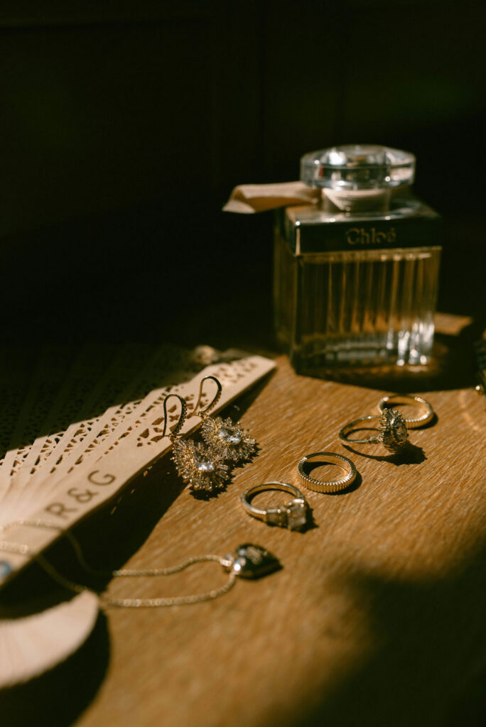 an intimate Italian escape wedding details rings and book in the shadows 
