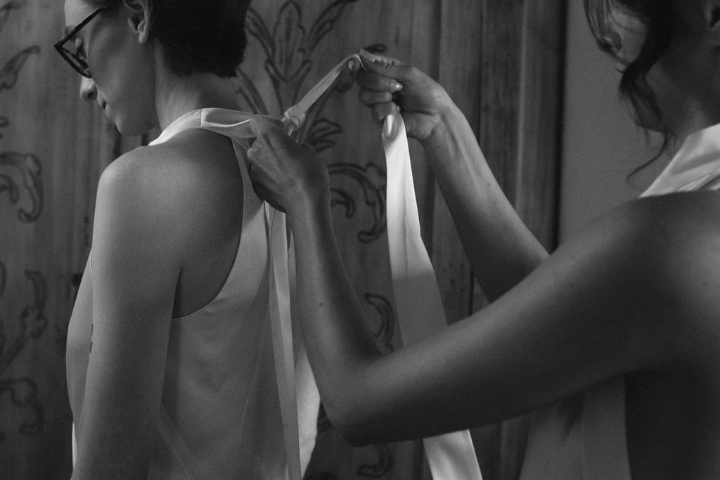 an intimate Italian escape wedding bride's getting ready together 