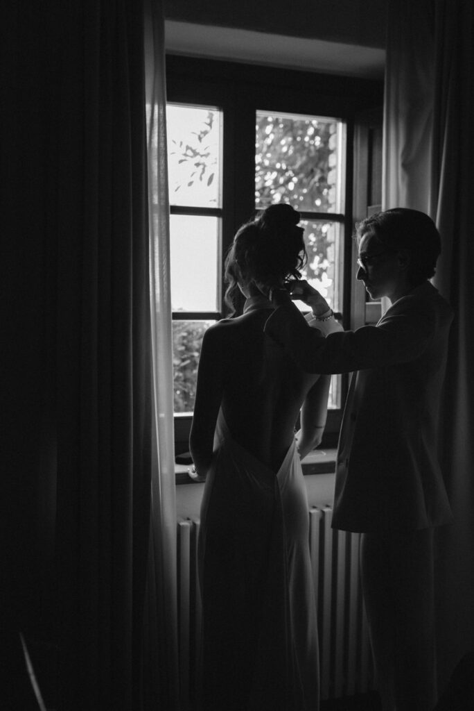 an intimate Italian escape wedding bride's getting ready together 