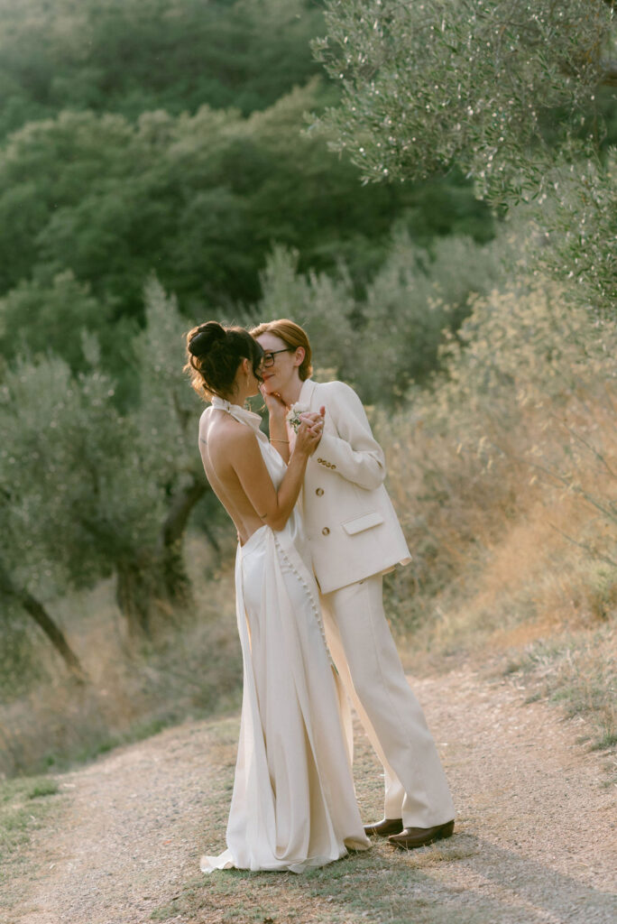 an intimate Italian escape wedding lgbtq wedding reception in an olive tree grove