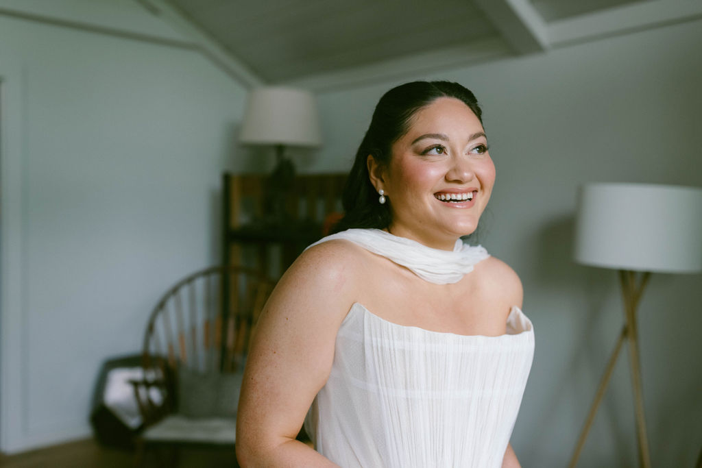 An Upstate New York Wedding at Woodhouse Lodge LGBTQ wedding Bride getting ready