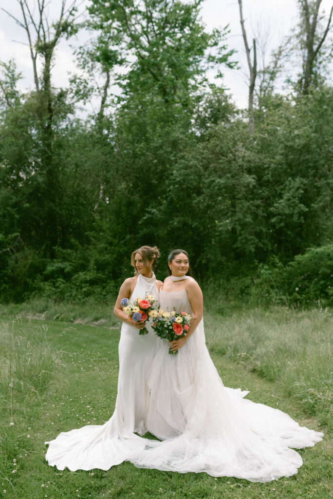 An Upstate New York Wedding at Woodhouse Lodge LGBTQ wedding Brides first look & portraits