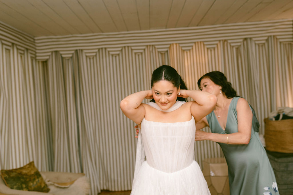An Upstate New York Wedding at Woodhouse Lodge LGBTQ wedding Bride getting ready