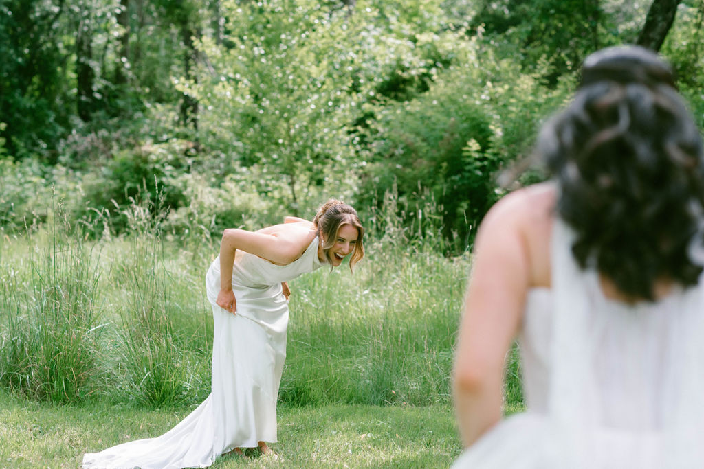An Upstate New York Wedding at Woodhouse Lodge LGBTQ wedding Brides first look & portraits