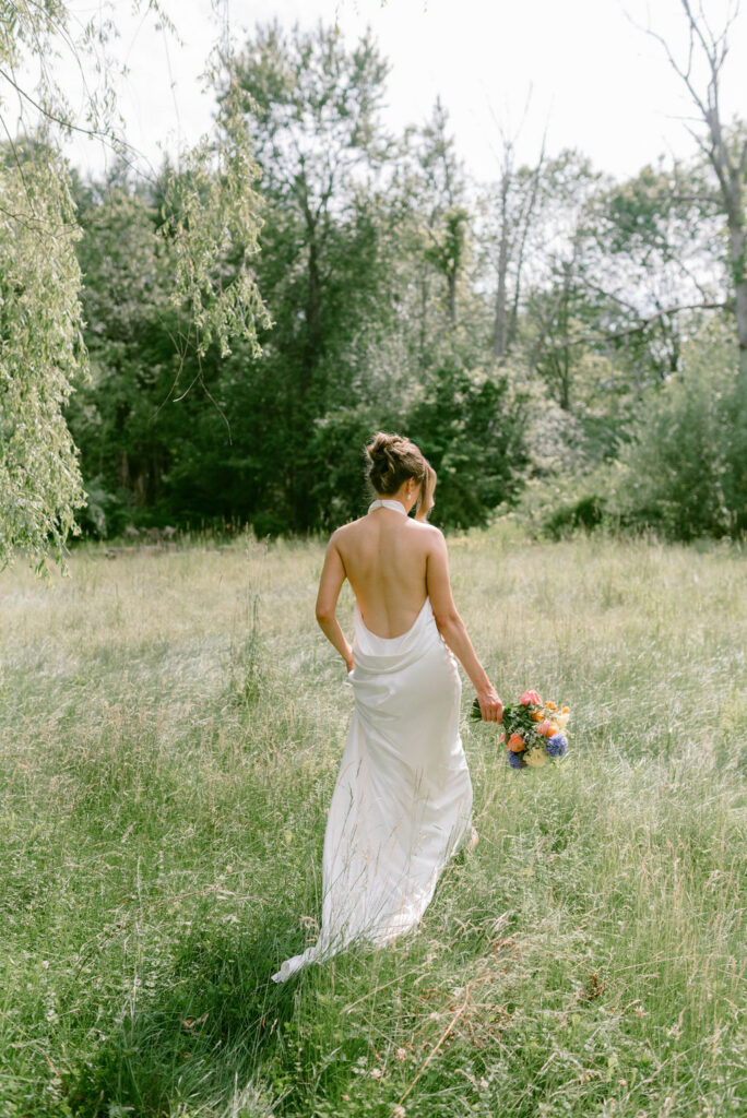 An Upstate New York Wedding at Woodhouse Lodge LGBTQ wedding Brides first look & portraits