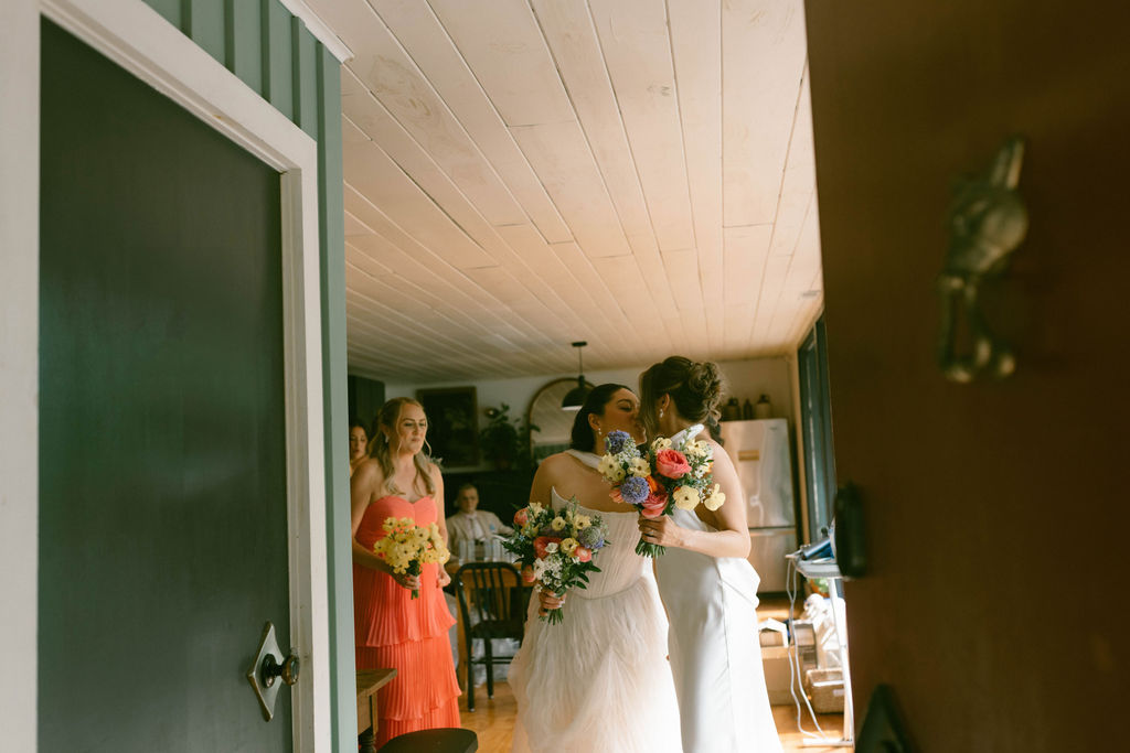 An Upstate New York Wedding at Woodhouse Lodge LGBTQ wedding Brides first look & portraits